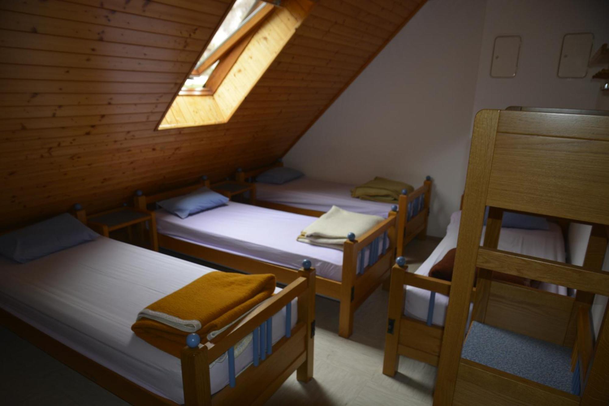 Pus Bavsica Hostel Log pod Mangartom Exterior photo